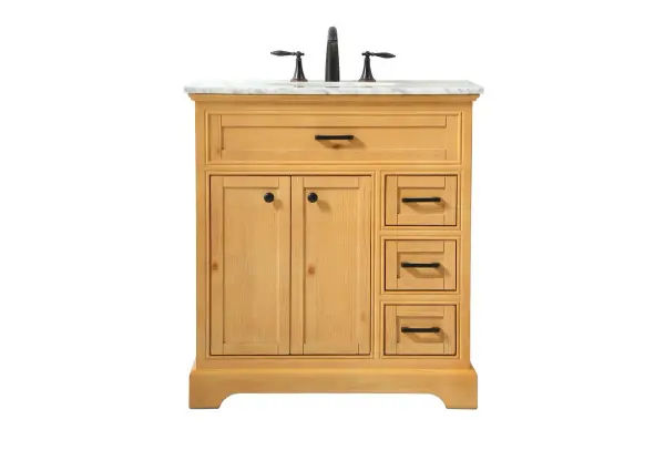 Clean lines and classic form can truly add a fresh look to your bathroom or powder room. This vanity, complemented by round hardware, will surely charm you with its confident style and subtle charisma. This vanity can store all of your bathroom toiletries, from extra towels to make up essentials. The vanity is crowned with carrara white marble and includes a porcelain undermount sink--adding both function and form that will truly amaze. Collection: Americana Rooms: bathroom Finish: natural wood Width: 21.50" Height: 35.00" Length: 32.00" Weight: 130.00 lb Material: Solid wood and MDF Country of Origin: Vietnam Manufacturer Warranty: 1 year limited