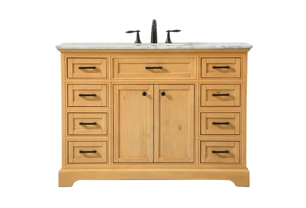 Clean lines and classic form can truly add a fresh look to your bathroom or powder room. This vanity, complemented by round hardware, will surely charm you with its confident style and subtle charisma. This vanity can store all of your bathroom toiletries, from extra towels to make up essentials. The vanity is crowned with carrara white marble and includes a porcelain undermount sink--adding both function and form that will truly amaze. Collection: Americana Rooms: bathroom Finish: natural wood Width: 21.50" Height: 35.00" Length: 48.00" Weight: 212.00 lb Material: Solid wood and MDF Country of Origin: Vietnam Manufacturer Warranty: 1 year limited