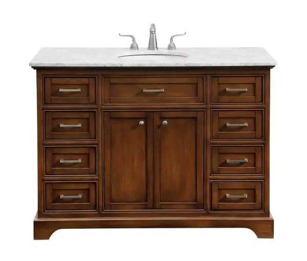 From its Italian Carrara white marble top to its contemporary-styled hand painted teakwood cabinet, this member of our "Americana" vanity collection is sure to enhance either your home or office bathroom. Beneath its lustrous, natural marble top and an oval, white porcelain under mount sink, is a cabinet with 4 handsome drawers on each side and 2 center doors with a Single shelf for all your bathroom essentials, highlighted with recessed panel doors, brushed steel bar handle and knobs, stands on strong solid pedestal feet. A wonderful balance of simplicity and practical function! Measurements: W48"xD21.5"xH35" Collection: Americana Finish: Teak Width: 21.50" Height: 35.00" Length: 48.00" Weight: 191.00 lb Material: Solid wood and MDF Country of Origin: Vietnam Manufacturer Warranty: 1 year limited Spec Sheet