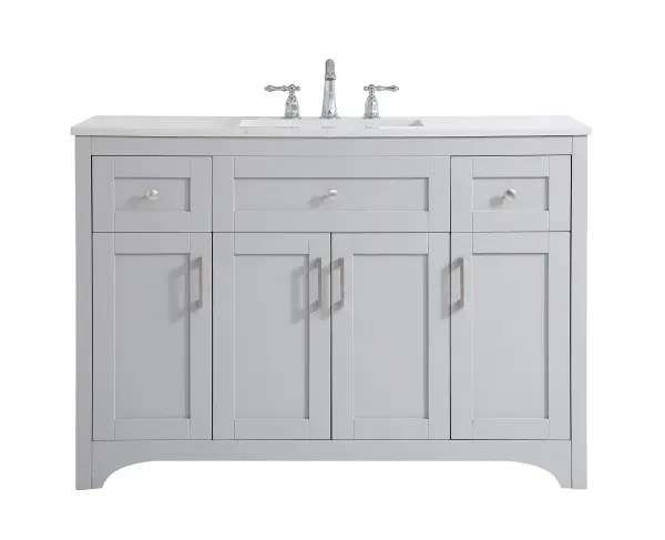 The refined simplicity of this 48" grey finish vanity creates a peaceful, yet stylish, atmosphere. Its traditional modernity adds a mature beauty that will elevate any bathroom or powder room--the Calacatta engineered marble counter top adds refined luxe while the brushed nickel handle bars open the 4 cabinet doors and 2 upper drawers, revealing ample storage space to store and hide away an assortment of bathroom essentials. Whether your home is large or small, this vanity will surely fit in well. Collection: moore Rooms: bathroom Finish: Grey Width: 22.00" Height: 34.00" Length: 48.00" Weight: 191.00 lb Material: mdf and engineered marble and porcelain and metal Country of Origin: Vietnam Manufacturer Warranty: 1 year limited Spec Sheet