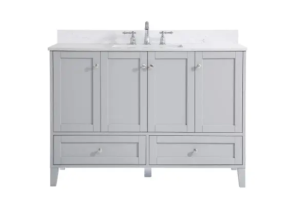 While unassuming, this 48" vanity in a grey finish sure knows how to redefine luxury. The sleek brushed nickel knobs adorn the 4 cabinet doors and 2 bottom drawers which allow you to store your bathroom toiletries and necessities. Standing strong on oblique legs and dressed with a Calacatta engineered marble countertop, this vanity will surely create beauty and casual elegance in your bathroom or powder room. Comes with a matching backsplash to complete the look and protects your wall. Collection: sommerville Rooms: bathroom Finish: Grey Width: 22.00" Height: 34.00" Length: 48.00" Weight: 198.00 lb Material: MDF Country of Origin: Vietnam Manufacturer Warranty: 1 year limited Spec Sheet