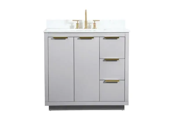 The Blake collection vanity cabinet will be a modern furniture statement piece in your bathroom. Our color combination creates a calming atmosphere in the room. The gold handles bring a vibrant touch to balance the vanity. With the simplistic clean lines, the cabinet catches eyes with its beautiful smooth surface. Open the cabinet doors to store what you desire and make use of the spacious area. Gently close the door and the soft closing glides will quietly closes the door. To top it off, the calacatta engineered marble adds a luxury and modern finish to the durable stonetop. Comes with a matching backsplash. Collection: Blake Rooms: bathroom Finish: Grey Width: 22.00" Height: 34.00" Length: 36.00" Weight: 180.00 lb Material: MDF Country of Origin: Vietnam Manufacturer Warranty: 1 year limited Spec Sheet