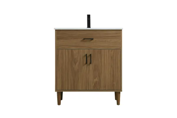 Transform your bathroom with this mid-century modern vanity, designed to bring both functionality and a sense of style to your space. Its clean lines, minimalist design, and tapered solid wood legs evoke a timeless charm, perfect for blending with modern and transitional interiors. The engineered marble countertop, with its unique faux marble veining, adds a refined, luxurious touch, while the porcelain sink is both durable and easy to maintain. Practicality meets aesthetics with a faux drawer for balanced design and a spacious double-door cabinet for efficient storage. Constructed from solid wood and MDF, this vanity offers lasting durability, while adjustable foot levelers ensure stability on any floor. Shipped mostly assembled, the solid wood legs can be effortlessly twisted into place, making installation quick and hassle-free. Collection: Chandler Rooms: bathroom Finish: Walnut Brown Width: 19.00" Height: 34.00" Length: 30.00" Weight: 83.00 lb Material: MDF and Solid wood Country of Origin: Malaysia Manufacturer Warranty: 1 year limited