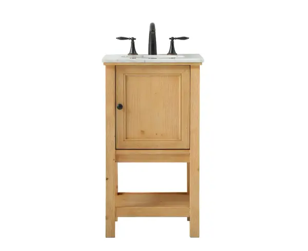 Clean lines and classic form can truly add a fresh look to your bathroom or powder room. This vanity, complemented by round hardware, will surely charm you with its confident style and subtle charisma. This vanity can store all of your bathroom toiletries, from extra towels to make up essentials. The vanity is crowned with carrara white marble and includes a porcelain undermount sink--adding both function and form that will truly amaze. Collection: Metropolis Rooms: bathroom Finish: natural wood Width: 19.00" Height: 34.00" Length: 19.00" Weight: 59.00 lb Material: Solid wood and MDF Country of Origin: Vietnam Manufacturer Warranty: 1 year limited
