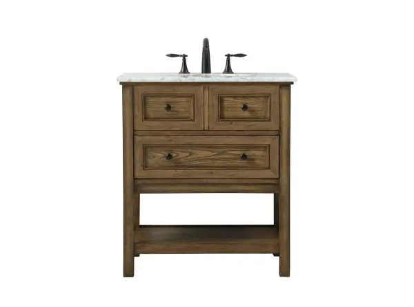 Clean lines and classic form can truly add a fresh look to your bathroom or powder room. This vanity, complemented by round hardware, will surely charm you with its confident style and subtle charisma. This vanity can store all of your bathroom toiletries, from extra towels to make up essentials. The vanity is crowned with carrara white marble and includes a porcelain undermount sink--adding both function and form that will truly amaze. Collection: Metropolis Rooms: bathroom Finish: driftwood Width: 22.00" Height: 34.00" Length: 30.00" Weight: 103.00 lb Material: Solid wood and MDF Country of Origin: Vietnam Manufacturer Warranty: 1 year limited