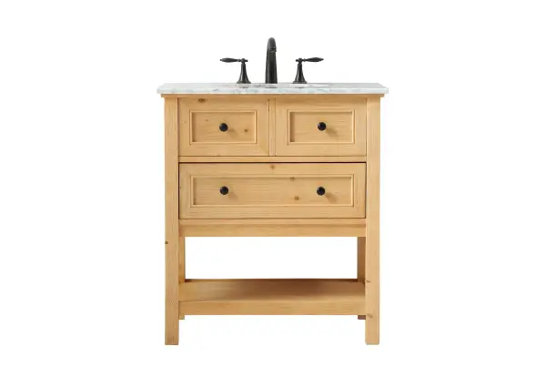 Clean lines and classic form can truly add a fresh look to your bathroom or powder room. This vanity, complemented by round hardware, will surely charm you with its confident style and subtle charisma. This vanity can store all of your bathroom toiletries, from extra towels to make up essentials. The vanity is crowned with carrara white marble and includes a porcelain undermount sink--adding both function and form that will truly amaze. Collection: Metropolis Rooms: bathroom Finish: natural wood Width: 22.00" Height: 34.00" Length: 30.00" Weight: 103.00 lb Material: Solid wood and MDF Country of Origin: Vietnam Manufacturer Warranty: 1 year limited