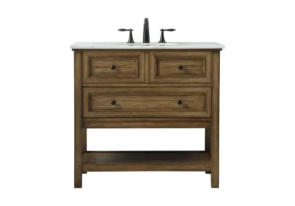Clean lines and classic form can truly add a fresh look to your bathroom or powder room. This vanity, complemented by round hardware, will surely charm you with its confident style and subtle charisma. This vanity can store all of your bathroom toiletries, from extra towels to make up essentials. The vanity is crowned with carrara white marble and includes a porcelain undermount sink--adding both function and form that will truly amaze. Collection: Metropolis Rooms: bathroom Finish: driftwood Width: 22.00" Height: 34.00" Length: 36.00" Weight: 121.00 lb Material: Solid wood and MDF Country of Origin: Vietnam Manufacturer Warranty: 1 year limited