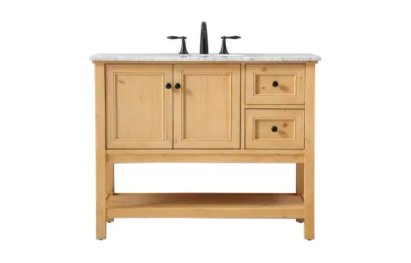 Clean lines and classic form can truly add a fresh look to your bathroom or powder room. This vanity, complemented by round hardware, will surely charm you with its confident style and subtle charisma. This vanity can store all of your bathroom toiletries, from extra towels to make up essentials. The vanity is crowned with carrara white marble and includes a porcelain undermount sink--adding both function and form that will truly amaze. Collection: Metropolis Rooms: bathroom Finish: natural wood Width: 22.00" Height: 34.00" Length: 42.00" Weight: 146.00 lb Material: Solid wood and MDF Country of Origin: Vietnam Manufacturer Warranty: 1 year limited