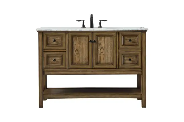 Clean lines and classic form can truly add a fresh look to your bathroom or powder room. This vanity, complemented by round hardware, will surely charm you with its confident style and subtle charisma. This vanity can store all of your bathroom toiletries, from extra towels to make up essentials. The vanity is crowned with carrara white marble and includes a porcelain undermount sink--adding both function and form that will truly amaze. Collection: Metropolis Rooms: bathroom Finish: driftwood Width: 22.00" Height: 34.00" Length: 48.00" Weight: 180.00 lb Material: Solid wood and MDF Country of Origin: Vietnam Manufacturer Warranty: 1 year limited