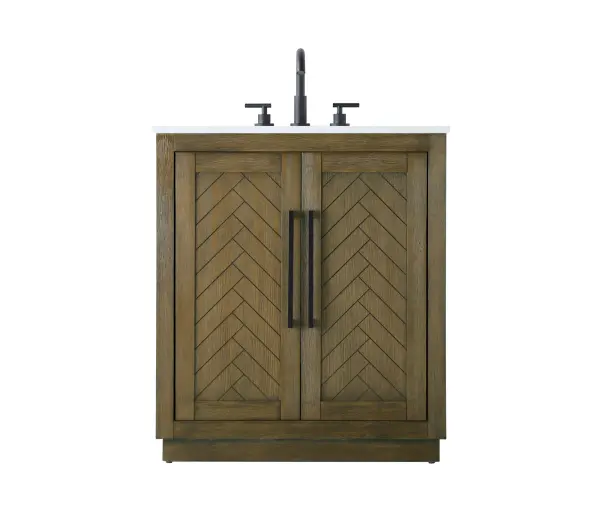 This transitional bathroom vanity offers the perfect blend of timeless style and modern functionality. Available in five refined finishes—crisp white, sleek grey, chocolate oak, honey oak, and linen oak—it complements a range of decor styles, from classic to contemporary. The stunning herringbone design on the Shaker-style door panels adds texture and craftsmanship to the piece. Topped with a white engineered marble countertop featuring subtle veining, it provides both beauty and durability. The long black metal pulls on the soft-closing doors add sleek, modern detailing. Practical features include a concealed overflow, a back panel cutout for easy plumbing installation, and a U-shaped cutout shelf to fit plumbing while maximizing storage space. With a toe kick all around the base, this vanity is thoughtfully designed to blend form and function in any bathroom setting. Collection: Chase Rooms: bathroom Finish: Hazel Oak Width: 19.00" Height: 34.00" Length: 30.00" Weight: 91.00 lb Material: Solid wood and MDF Country of Origin: Vietnam Manufacturer Warranty: 1 year limited