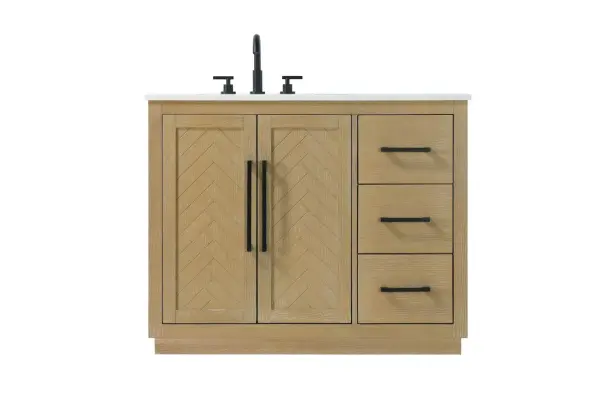 This transitional bathroom vanity offers the perfect blend of timeless style and modern functionality. Available in five refined finishes—crisp white, sleek grey, chocolate oak, honey oak, and linen oak—it complements a range of decor styles, from classic to contemporary. The stunning herringbone design on the Shaker-style door panels adds texture and craftsmanship to the piece. Topped with a white engineered marble countertop featuring subtle veining, it provides both beauty and durability. The long black metal pulls on the soft-closing doors and the thin bar pulls on the drawers add sleek, modern detailing. Practical features include a concealed overflow, a back panel cutout for easy plumbing installation, and a U-shaped cutout shelf to fit plumbing while maximizing storage space. With a toe kick all around the base, this vanity is thoughtfully designed to blend form and function in any bathroom setting. Collection: Chase Rooms: bathroom Finish: Linen Oak Width: 21.50" Height: 34.00" Length: 42.00" Weight: 172.00 lb Material: Solid wood and MDF Country of Origin: Vietnam Manufacturer Warranty: 1 year limited
