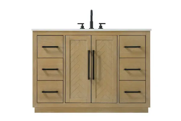 This transitional bathroom vanity offers the perfect blend of timeless style and modern functionality. Available in five refined finishes—crisp white, sleek grey, chocolate oak, honey oak, and linen oak—it complements a range of decor styles, from classic to contemporary. The stunning herringbone design on the Shaker-style door panels adds texture and craftsmanship to the piece. Topped with a white engineered marble countertop featuring subtle veining, it provides both beauty and durability. The long black metal pulls on the soft-closing doors and the thin bar pulls on the drawers add sleek, modern detailing. Practical features include a concealed overflow, a back panel cutout for easy plumbing installation, and a U-shaped cutout shelf to fit plumbing while maximizing storage space. With a toe kick all around the base, this vanity is thoughtfully designed to blend form and function in any bathroom setting. Collection: Chase Rooms: bathroom Finish: Linen Oak Width: 21.50" Height: 34.00" Length: 48.00" Weight: 222.00 lb Material: Solid wood and MDF Country of Origin: Vietnam Manufacturer Warranty: 1 year limited
