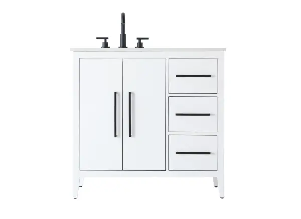 The Millie vanity combines transitional elegance with modern functionality. Its white finish, engineered marble countertop, and sleek black metal pulls create a refined aesthetic, while soft-closing drawers and tapered legs deliver smooth operation.