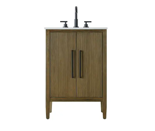 Designed with transitional elegance in mind, this bathroom vanity seamlessly blends traditional elements with modern functionality. Available in five stunning finishes, from the clean sophistication of Crisp White to the natural warmth of Honey Oak, the fluted door and drawer panels add subtle texture and charm. The white engineered marble countertop with natural veining exudes luxury, while the soft-closing doors with sleek black metal pulls offer a quiet, refined experience. Practicality is never compromised, with features like the U-shaped shelf for plumbing, and pre-drilled faucet holes for easy customization. Whether your style leans modern or classic, this vanity is the perfect balance of beauty and function, appealing to customers with a taste for quality and style. Collection: Blakely Rooms: bathroom Finish: Hazel Oak Width: 21.50" Height: 35.00" Length: 24.00" Weight: 84.00 lb Material: Solid wood and MDF Country of Origin: Vietnam Manufacturer Warranty: 1 year limited