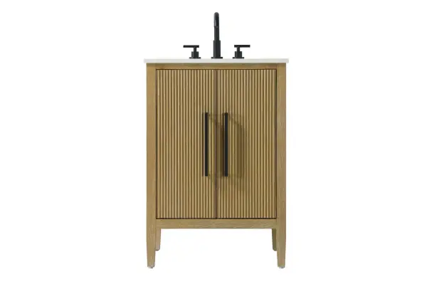 Designed with transitional elegance in mind, this bathroom vanity seamlessly blends traditional elements with modern functionality. Available in five stunning finishes, from the clean sophistication of Crisp White to the natural warmth of Honey Oak, the fluted door and drawer panels add subtle texture and charm. The white engineered marble countertop with natural veining exudes luxury, while the soft-closing doors with sleek black metal pulls offer a quiet, refined experience. Practicality is never compromised, with features like the U-shaped shelf for plumbing, and pre-drilled faucet holes for easy customization. Whether your style leans modern or classic, this vanity is the perfect balance of beauty and function, appealing to customers with a taste for quality and style. Collection: Blakely Rooms: bathroom Finish: Linen Oak Width: 21.50" Height: 35.00" Length: 24.00" Weight: 84.00 lb Material: Solid wood and MDF Country of Origin: Vietnam Manufacturer Warranty: 1 year limited