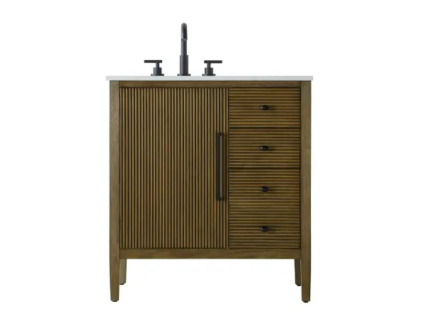 Designed with transitional elegance in mind, this bathroom vanity seamlessly blends traditional elements with modern functionality. Available in five stunning finishes, from the clean sophistication of Crisp White to the natural warmth of Honey Oak, the fluted door and drawer panels add subtle texture and charm. The white engineered marble countertop with natural veining exudes luxury, while the soft-closing doors and drawers with sleek black metal pulls offer a quiet, refined experience. Practicality is never compromised, with features like the U-shaped shelf for plumbing, deeper bottom drawer for ample storage, and pre-drilled faucet holes for easy customization. Whether your style leans modern or classic, this vanity is the perfect balance of beauty and function, appealing to customers with a taste for quality and style. Collection: Blakely Rooms: bathroom Finish: Hazel Oak Width: 21.50" Height: 34.00" Length: 32.00" Weight: 128.00 lb Material: Solid wood and MDF Country of Origin: Vietnam Manufacturer Warranty: 1 year limited