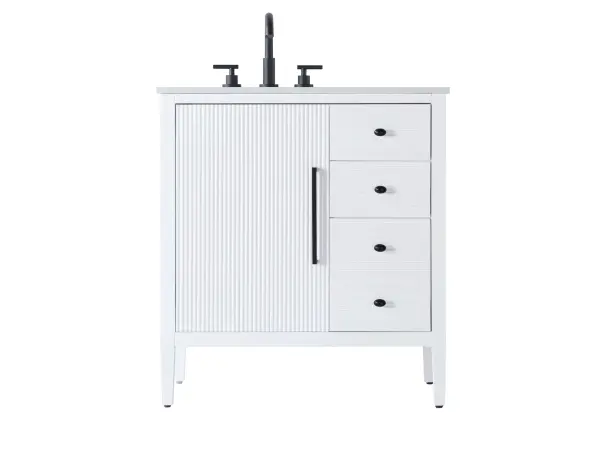 The Blakely vanity combines traditional fluted door panels with modern functionality, featuring a white engineered marble countertop, soft-closing drawers, and ample storage. Its transitional design works in both classic and contemporary bathrooms.