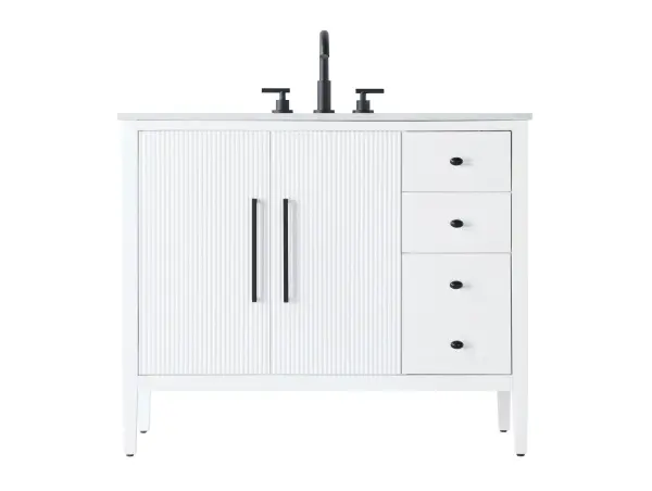 The Blakely vanity combines traditional fluted door panels with modern functionality, featuring a white engineered marble countertop, soft-closing drawers, and ample storage. Its transitional design works beautifully in both classic and contemporary bathrooms.