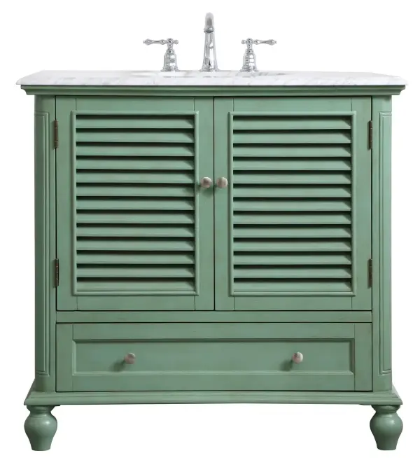 Never compromise beauty--the Rhodes collection stunning vanity in a vintage mint finish will add a lovely splash of color and complement any bathroom or powder room, while utilizing its charm and function to provide you with ample storage spaces. Brushed nickel knobs gently adorn the shuttered cabinet doors and long drawer at the base, allowing for you to store away your bathroom essentials. The Carrara white marble countertop, porcelain undermount sink, dignified subtle engravings on the side edges, and rounded legs all come together to create contemporary beauty. Work with your space, and design a beautiful room, no matter the size. Collection: Rhodes Rooms: bathroom Finish: vintage mint Width: 22.00" Height: 35.00" Length: 36.00" Weight: 136.00 lb Material: solid wood and mdf Country of Origin: Vietnam Manufacturer Warranty: 1 year limited Spec Sheet