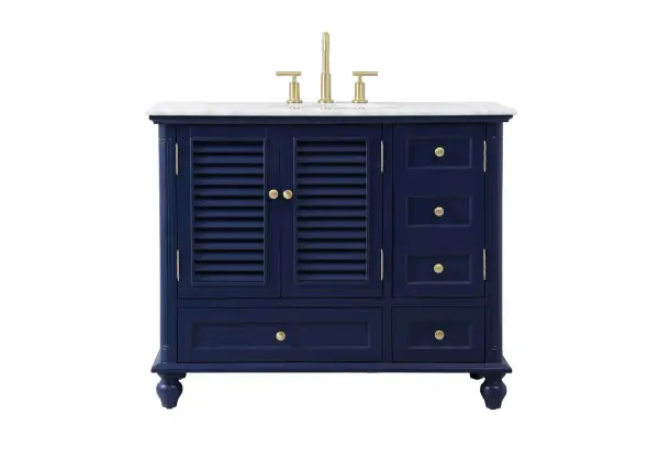The Rhodes collection compact vanity will add lovely sophistication and complement any small bathroom or powder room, while utilizing its charm and function to provide you with ample storage spaces. Metal round knobs gently adorn the shuttered cabinet door and drawer at the base, allowing for you to store away your bathroom essentials. The Carrara white marble countertop, porcelain undermount sink, dignified subtle engravings on the side edges, and rounded legs all come together to create contemporary beauty. Work with your space, and design a beautiful room, no matter the size. Collection: Rhodes Rooms: bathroom Finish: Blue Width: 22.00" Height: 35.00" Length: 42.00" Weight: 163.00 lb Material: Solid wood and MDF Country of Origin: Vietnam Manufacturer Warranty: 1 year limited Spec Sheet