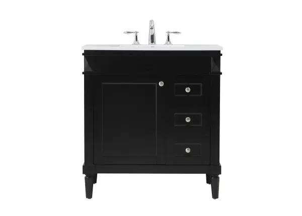 This transitional vanity is a beautiful piece of bathroom furniture will look amazing in your design scheme. The cabinet features a shaker style smooth door panel with simple round knobs and soft close hinges provide ample room for accessories. Packed with multiple side drawers with soft close glides for added comfort and full access to bath supplies. Convenient deep drawer stores all of your tall bath essentials. Constructed of engineered wood and solid wood legs with hand painted finish. The durable engineered marble countertop is a versatile material in an ivory white finish. Minor assembly of the legs needed to get this vanity up and running. Collection: Bennett Rooms: bathroom Finish: black Width: 21.00" Height: 35.00" Length: 32.00" Weight: 130.00 lb Material: Solid wood and MDF Country of Origin: Vietnam Manufacturer Warranty: 1 year limited
