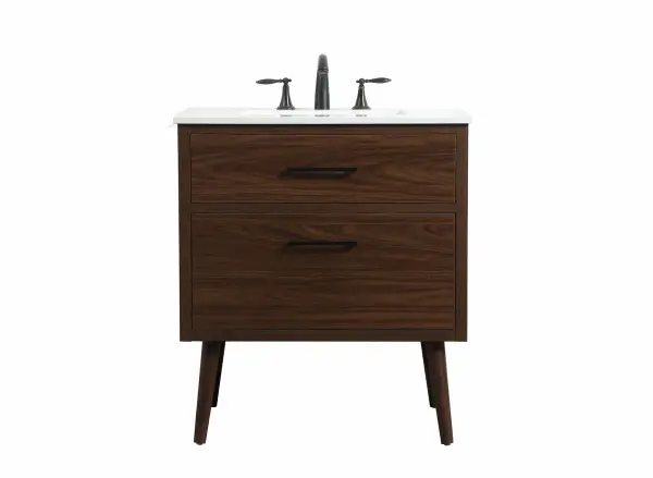 This bathroom vanity is a perfect way to outfit your home in authetic midcentury modern style. The clean lines anchors the design, while the oblique tapered cylinder legs add subtle interest. A black handle adorns the top drawer hiding the base of the undermount porcelain sink while another one allows you to pull the bottom drawer out, letting you store your bathroom necessities and toiletries. The storage drawers provide much needed function and can be used for stowing items like extra toothbrushes, hairbrushes, and other bathroom essentials to help you get ready to face the day. This vanity is a quick update for your bathroom with trendy style. Collection: Boise Rooms: bathroom Finish: Walnut Width: 22.00" Height: 33.50" Length: 30.00" Weight: 100.00 lb Material: Solid wood and MDF Country of Origin: Vietnam Manufacturer Warranty: 1 year limited