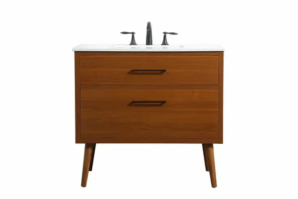 This bathroom vanity is a perfect way to outfit your home in authetic midcentury modern style. The clean lines anchors the design, while the oblique tapered cylinder legs add subtle interest. A black handle adorns the top drawer hiding the base of the undermount porcelain sink while another one allows you to pull the bottom drawer out, letting you store your bathroom necessities and toiletries. The storage drawers provide much needed function and can be used for stowing items like extra toothbrushes, hairbrushes, and other bathroom essentials to help you get ready to face the day. This vanity is a quick update for your bathroom with trendy style. Collection: Boise Rooms: bathroom Finish: teak Width: 22.00" Height: 33.50" Length: 36.00" Weight: 115.00 lb Material: Solid wood and MDF Country of Origin: Vietnam Manufacturer Warranty: 1 year limited