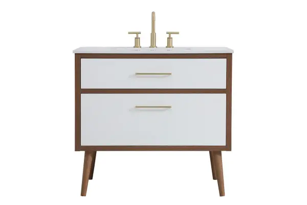 Delve into a world of minimalistic fashion and contemporary styling with this midcentury modern 36" vanity. The clean lines anchors the design, while the oblique tapered cylinder legs add subtle interest. However, the artful juxtaposition between the walnut brown and matte white creates a blend of bright modernity and classical traditions. A gold handle adorns the top fake drawer hiding the base of the undermount porcelain sink while another one allows you to pull the bottom drawer out, letting you store your bathroom necessities and toiletries. The compact size makes it the perfect vanity for any bathroom or powder room, regardless of size. Collection: Boise Rooms: bathroom Finish: White Width: 22.00" Height: 33.50" Length: 36.00" Weight: 115.00 lb Material: Engineered stone and Porcelain and steel Country of Origin: Vietnam Manufacturer Warranty: 1 year limited Spec Sheet