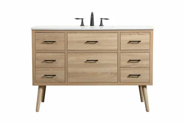 This bathroom vanity is a perfect way to outfit your home in authetic midcentury modern style. The clean lines anchors the design, while the oblique tapered cylinder legs add subtle interest. A black handle adorns the top drawer hiding the base of the undermount porcelain sink while another one allows you to pull the bottom drawer out, letting you store your bathroom necessities and toiletries. The storage drawers provide much needed function and can be used for stowing items like extra toothbrushes, hairbrushes, and other bathroom essentials to help you get ready to face the day. This vanity is a quick update for your bathroom with trendy style. Collection: Boise Rooms: bathroom Finish: mango wood Width: 22.00" Height: 33.50" Length: 48.00" Weight: 150.00 lb Material: Solid wood and MDF Country of Origin: Vietnam Manufacturer Warranty: 1 year limited