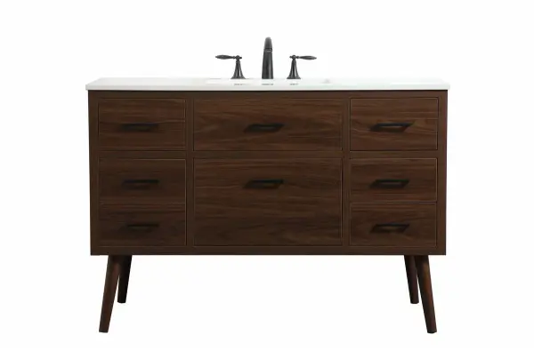 This bathroom vanity is a perfect way to outfit your home in authetic midcentury modern style. The clean lines anchors the design, while the oblique tapered cylinder legs add subtle interest. A black handle adorns the top drawer hiding the base of the undermount porcelain sink while another one allows you to pull the bottom drawer out, letting you store your bathroom necessities and toiletries. The storage drawers provide much needed function and can be used for stowing items like extra toothbrushes, hairbrushes, and other bathroom essentials to help you get ready to face the day. This vanity is a quick update for your bathroom with trendy style. Collection: Boise Rooms: bathroom Finish: Walnut Width: 22.00" Height: 33.50" Length: 48.00" Weight: 150.00 lb Material: Solid wood and MDF Country of Origin: Vietnam Manufacturer Warranty: 1 year limited