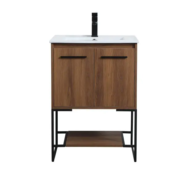 Live in modern comfort with this 24" walnut brown finish vanity. Dressed in a concrete grey and sleek black metal hardware, its contemporary style will have your bathroom or powder room elevated in industrial sophistication. The open shelf at the base and two doors reveal ample storage space for your bathroom essentials and miscellany. Clean lines create its own visual interest, adding trendy looks to your already chic room. Collection: Gerard Rooms: bathroom Finish: Walnut Brown Width: 18.31" Height: 33.46" Length: 24.00" Weight: 66.00 lb Material: MDF, resin, metal Country of Origin: Vietnam Manufacturer Warranty: 1 year limited Spec Sheet