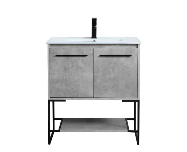 Live in modern comfort with this 30" concrete grey finish vanity. Dressed in a concrete grey and sleek black metal hardware, its contemporary style will have your bathroom or powder room elevated in industrial sophistication. The open shelf at the base and two doors reveal ample storage space for your bathroom essentials and miscellany. Clean lines create its own visual interest, adding trendy looks to your already chic room. Collection: Gerard Rooms: bathroom Finish: Concrete Grey Width: 18.31" Height: 33.46" Length: 30.00" Weight: 73.00 lb Material: MDF, resin, metal Country of Origin: Vietnam Manufacturer Warranty: 1 year limited Spec Sheet