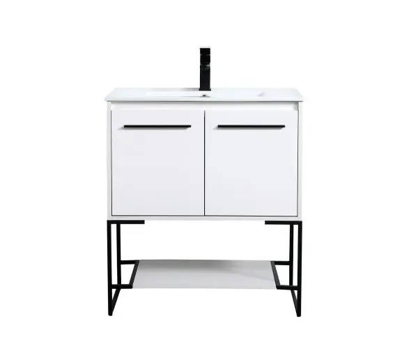 Live in modern comfort with this 30" white finish vanity. Dressed in a concrete grey and sleek black metal hardware, its contemporary style will have your bathroom or powder room elevated in industrial sophistication. The open shelf at the base and two doors reveal ample storage space for your bathroom essentials and miscellany. Clean lines create its own visual interest, adding trendy looks to your already chic room. Collection: Gerard Rooms: bathroom Finish: White Width: 18.31" Height: 33.46" Length: 30.00" Weight: 73.00 lb Material: MDF, resin, metal Country of Origin: Vietnam Manufacturer Warranty: 1 year limited Spec Sheet