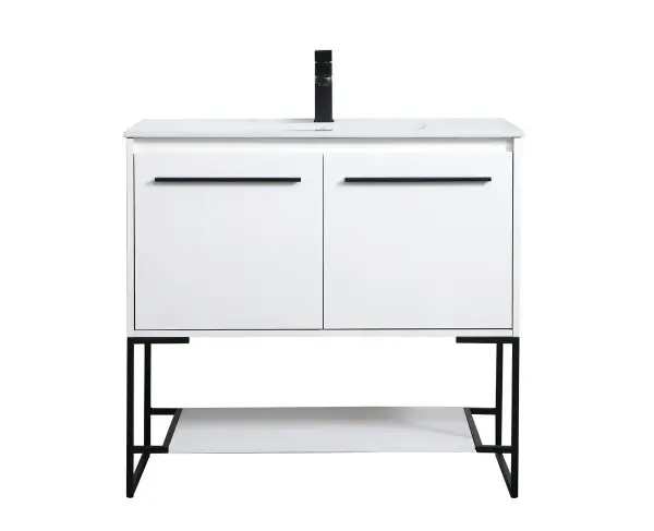 Live in modern comfort with this 36" white finish vanity. Dressed in a concrete grey and sleek black metal hardware, its contemporary style will have your bathroom or powder room elevated in industrial sophistication. The open shelf at the base and two doors reveal ample storage space for your bathroom essentials and miscellany. Clean lines create its own visual interest, adding trendy looks to your already chic room. Collection: Gerard Rooms: bathroom Finish: White Width: 18.31" Height: 33.46" Length: 36.00" Weight: 86.00 lb Material: MDF, resin, metal Country of Origin: Vietnam Manufacturer Warranty: 1 year limited Spec Sheet