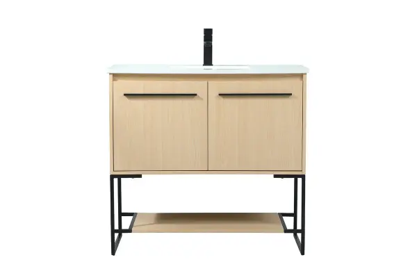 Live in modern comfort with this 36" maple finish vanity. Dressed in a maple and sleek black metal hardware, its contemporary style will have your bathroom or powder room elevated in industrial sophistication. The open shelf at the base and two doors reveal ample storage space for your bathroom essentials and miscellany. Clean lines create its own visual interest, adding trendy looks to your already chic room. Collection: Sloane Rooms: bathroom Finish: Maple Width: 18.00" Height: 33.50" Length: 36.00" Weight: 100.00 lb Material: mdf Country of Origin: Vietnam Manufacturer Warranty: 1 year limited Spec Sheet