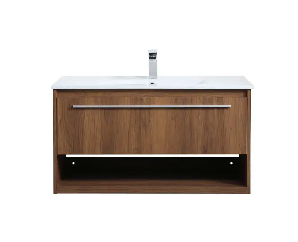 Save space and make your bathroom appear bigger with this 36" floating vanity in a walnut brown finish. Its minimal design will have you in awe, while its clean lines will leave your room feeling fresh and uncluttered. The Single u-drawer pulls out for storage while the open space below allows you to place extra towels or various other essentials. Collection: Kasper Rooms: bathroom Finish: Walnut Brown Width: 18.31" Height: 19.69" Length: 36.00" Weight: 82.00 lb Material: MDF, resin, metal Country of Origin: Malaysia Manufacturer Warranty: 1 year limited Spec Sheet