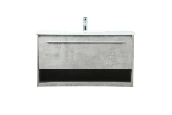 Save space and make your bathroom appear bigger with this floating vanity. Its minimal design will have you in awe, while its clean lines will leave your room feeling fresh and uncluttered. The Single u-drawer pulls out for storage while the open space below allows you to place extra towels or various other essentials. The ivory white engineered marble counter top with porcelain sink adds refined luxe while the aluminum barpull style handle adorn the vanity face. Collection: Roman Rooms: bathroom Finish: Concrete Grey Width: 18.00" Height: 19.70" Length: 36.00" Weight: 94.00 lb Material: MDF Country of Origin: Vietnam Manufacturer Warranty: 1 year limited Spec Sheet