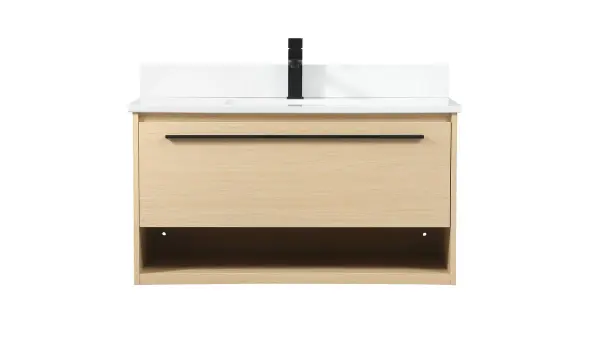 This wall-mounted vanity maximizes floor space while delivering refined style. The maple finish and ivory marble top create a sophisticated look, while the single drawer and open shelf provide practical storage.