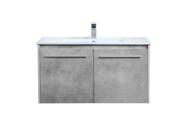 The contemporary simplicity of this 36" floating vanity in a concrete grey finish will help open the space and add stunning modern flair to your bathroom or powder room. The open space below makes it easy to show off your tiles and to clean the floor with ease--it's also the perfect place for a hamper. Double doors open to reveal plentiful of storage pace to store all of your bathroom miscellany. The clean lines that permeate through the design will surely create a fresh look in your home. Collection: Rasina Rooms: bathroom Finish: Concrete Grey Width: 18.31" Height: 19.69" Length: 36.00" Weight: 71.00 lb Material: MDF, resin, metal Country of Origin: Malaysia Manufacturer Warranty: 1 year limited Spec Sheet