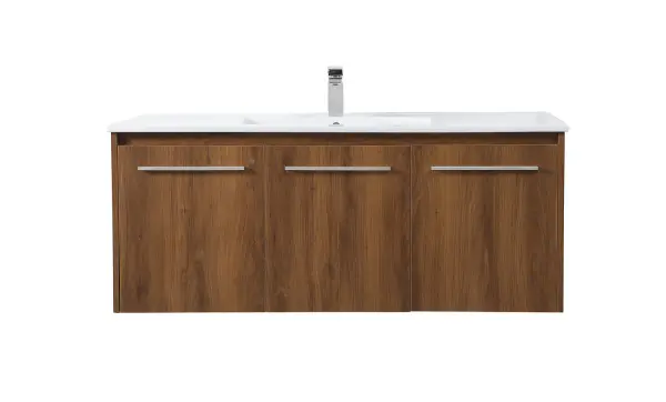 The contemporary simplicity of this 48" floating vanity in a walnut brown finish will help open the space and add stunning modern flair to your bathroom or powder room. The open space below makes it easy to show off your tiles and to clean the floor with ease--it's also the perfect place for a hamper. 3 doors open to reveal plentiful of storage pace to store all of your bathroom miscellany. The clean lines that permeate through the design will surely create a fresh look in your home. Collection: Rasina Rooms: bathroom Finish: Walnut Brown Width: 18.31" Height: 19.69" Length: 48.00" Weight: 99.00 lb Material: MDF, resin, metal Country of Origin: Malaysia Manufacturer Warranty: 1 year limited Spec Sheet