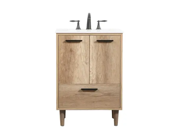 Exquisite modern sophistication is defined with the wood look and black barpulls of this vanity and slender tapered legs. Its length makes it the perfect addition to any sized home, and saves space with its storage area hidden behind the double cabinet doors and one bottom drawer. Topped with a highly durable engineered marble countertop and a porcelain undermount sink, this modern design will become your focal point of your bathroom or powder room. Equipped with soft-closing drawer and doors adds a quiet functional touch. Collection: Baldwin Rooms: bathroom Finish: natural oak Width: 19.00" Height: 34.00" Length: 24.00" Weight: 95.00 lb Material: Solid wood and MDF Country of Origin: Malaysia Manufacturer Warranty: 1 year limited