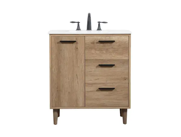 Exquisite modern sophistication is defined with the wood look and black barpulls of this vanity and slender tapered legs. Its length makes it the perfect addition to any sized home, and saves space with its storage area hidden behind the Single cabinet doors and two functional drawers. Topped with a highly durable engineered marble countertop and a porcelain undermount sink, this modern design will become your focal point of your bathroom or powder room. Equipped with soft-closing drawer and doors adds a quiet functional touch. Collection: Baldwin Rooms: bathroom Finish: natural oak Width: 19.00" Height: 34.00" Length: 30.00" Weight: 120.00 lb Material: Solid wood and MDF Country of Origin: Malaysia Manufacturer Warranty: 1 year limited
