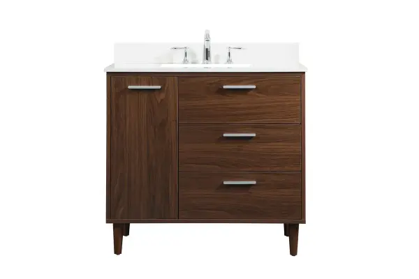 The Baldwin vanity combines modern sophistication with practical storage in a compact 36-inch footprint. Rich walnut finish and sleek silver hardware create an upscale look, while soft-close drawers and engineered stone countertop deliver lasting quality.