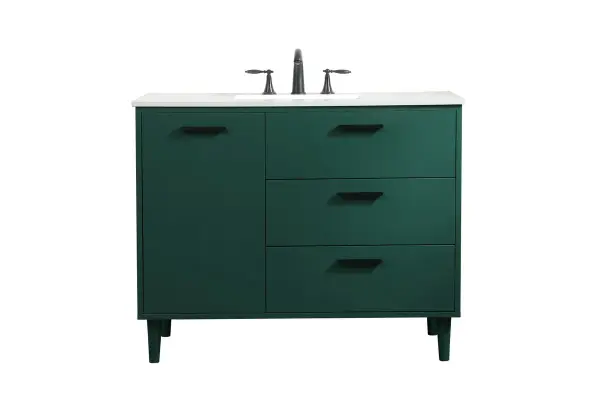 Modern sophistication is defined with the green finish and black barpulls of this vanity and slender tapered legs. Its length makes it the perfect addition to any sized home, and saves space with its storage area hidden behind the Single cabinet door and two bottom drawers. Topped with a highly durable engineered stone countertop and a porcelain undermount sink, this modern design will become your focal point of your bathroom. Equipped with soft-closing drawer and doors adds a quiet functional touch. Collection: Baldwin Rooms: Bathroom Finish: Green Width: 22.00" Height: 34.00" Length: 42.00" Weight: 165.00 lb Material: Solid wood and MDF Country of Origin: Malaysia Manufacturer Warranty: 1 year limited Spec Sheet