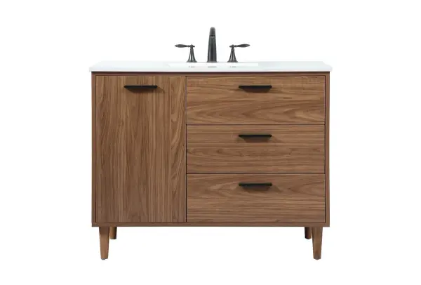 Exquisite modern sophistication is defined with the wood look and black barpulls of this vanity and slender tapered legs. Its length makes it the perfect addition to any sized home, and saves space with its storage area hidden behind the Single cabinet doors and two functional drawers. Topped with a highly durable engineered marble countertop and a porcelain undermount sink, this modern design will become your focal point of your bathroom or powder room. Equipped with soft-closing drawer and doors adds a quiet functional touch. Collection: Baldwin Rooms: bathroom Finish: walnut brown Width: 22.00" Height: 34.00" Length: 42.00" Weight: 165.00 lb Material: Solid wood and MDF Country of Origin: Malaysia Manufacturer Warranty: 1 year limited