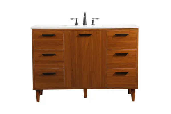 Modern sophistication is defined with the teak finish and black barpulls of this vanity and slender tapered legs. Its length makes it the perfect addition to any sized home, and saves space with its storage area hidden behind the Single cabinet door and six drawers. Topped with a highly durable engineered stone countertop and a porcelain undermount sink, this modern design will become your focal point of your bathroom. Equipped with soft-closing drawer and doors adds a quiet functional touch. Collection: Baldwin Rooms: Bathroom Finish: Teak Width: 22.00" Height: 34.00" Length: 48.00" Weight: 201.00 lb Material: Solid wood and MDF Country of Origin: Malaysia Manufacturer Warranty: 1 year limited Spec Sheet