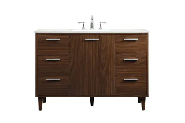 Modern sophistication is defined with the walnut finish and silver barpulls of this vanity and slender tapered legs. Its length makes it the perfect addition to any sized home, and saves space with its storage area hidden behind the Single cabinet door and six drawers. Topped with a highly durable engineered stone countertop and a porcelain undermount sink, this modern design will become your focal point of your bathroom. Equipped with soft-closing drawer and doors adds a quiet functional touch. Collection: Baldwin Rooms: Bathroom Finish: Walnut Width: 22.00" Height: 34.00" Length: 48.00" Weight: 201.00 lb Material: Solid wood and MDF Country of Origin: Malaysia Manufacturer Warranty: 1 year limited Spec Sheet