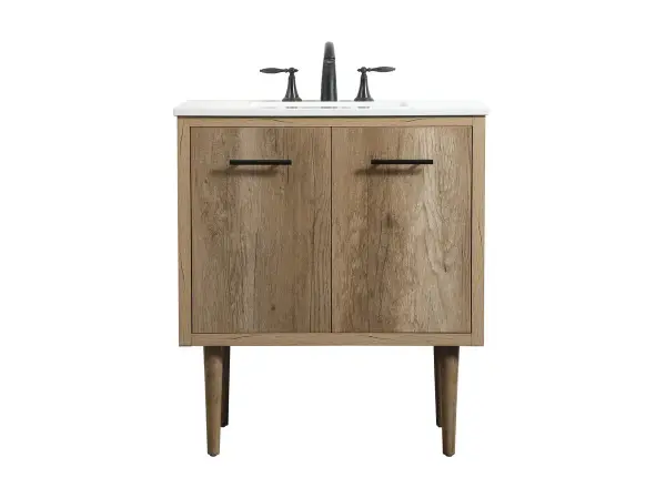 Delve into a world of minimalistic fashion and contemporary styling with this midcentury modern vanity. The clean lines anchors the design, while the straight tapered cylinder legs add subtle interest. Bar pull handle adorns the soft closing door hiding the base of the rectangular porcelain sink and letting you store your bathroom necessities and toiletries. Whether you want to use this as a floating vanity or a freestanding vanity, the choice is yours. The durable ivory white engineered marble countertop complements the manufactured wood base vanity and is built to last. Collection: Cyrus Rooms: bathroom Finish: Natural oak Width: 19.00" Height: 33.50" Length: 30.00" Weight: 86.00 lb Material: Solid wood and MDF Country of Origin: Vietnam Manufacturer Warranty: 1 year limited