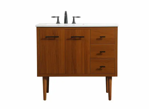 Delve into a world of minimalistic fashion and contemporary styling with this midcentury modern vanity. The clean lines anchors the design, while the straight tapered cylinder legs add subtle interest. Bar pull handle adorns the soft closing door hiding the base of the rectangular porcelain sink and letting you store your bathroom necessities and toiletries. Three soft closing drawers add plenty of storage option. Whether you want to use this as a floating vanity or a freestanding vanity, the choice is yours. The durable ivory white engineered marble countertop complements the manufactured wood base vanity and is built to last. Collection: Cyrus Rooms: bathroom Finish: Teak Width: 22.00" Height: 33.50" Length: 36.00" Weight: 127.00 lb Material: Solid wood and MDF Country of Origin: Vietnam Manufacturer Warranty: 1 year limited