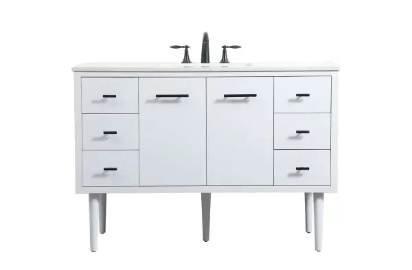 Delve into a world of minimalistic fashion and contemporary styling with this midcentury modern vanity. The clean lines anchors the design, while the straight tapered cylinder legs add subtle interest. Bar pull handle adorns the soft closing door hiding the base of the rectangular porcelain sink and letting you store your bathroom necessities and toiletries. Six soft closing drawers add plenty of storage option. Whether you want to use this as a floating vanity or a freestanding vanity, the choice is yours. The durable ivory white engineered marble countertop complements the manufactured wood base vanity and is built to last. Collection: Cyrus Rooms: bathroom Finish: White Width: 22.00" Height: 33.50" Length: 48.00" Weight: 175.00 lb Material: Solid wood and MDF Country of Origin: Vietnam Manufacturer Warranty: 1 year limited